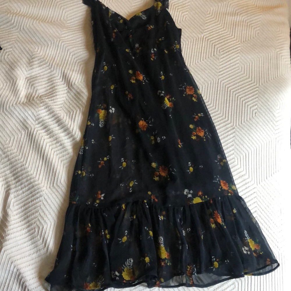 Navy blue midi with floral pattern.